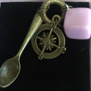 Spoon and compass charm